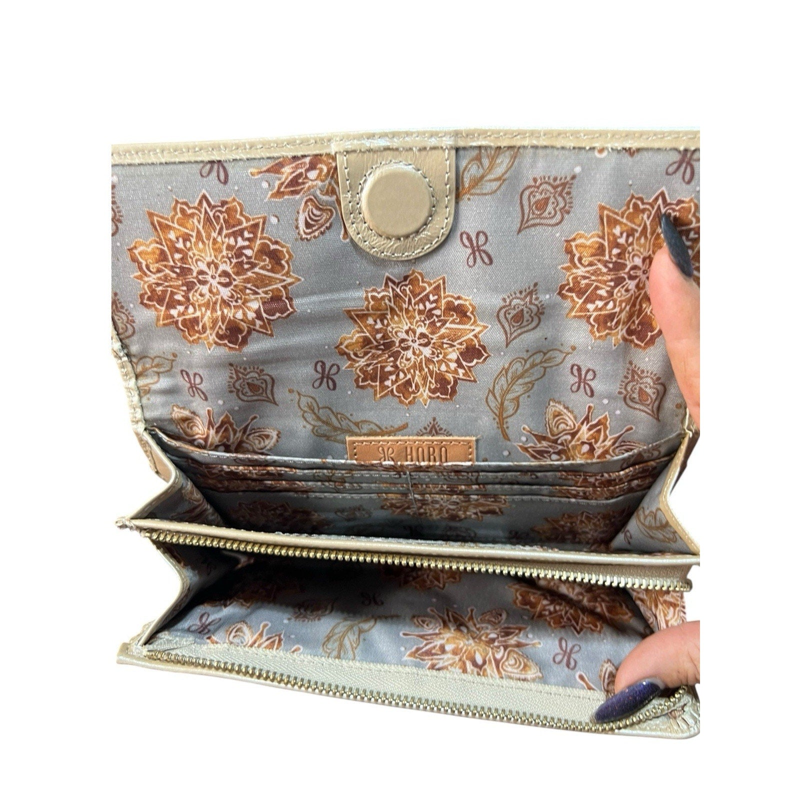Hobo brand leather Long wallet featuring a glossy, textured Finish