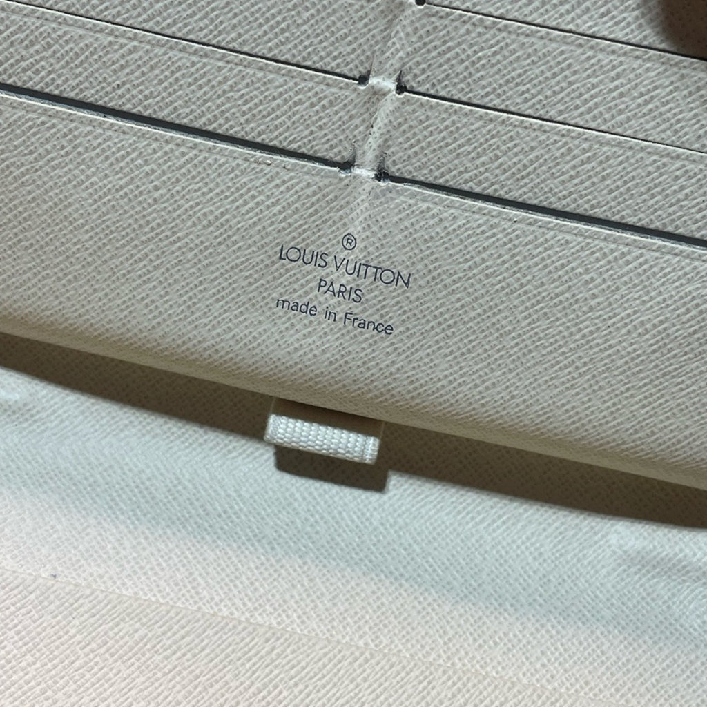 Louis Vuitton Azure large Organizer Wallet Full zip. Comes with a COA