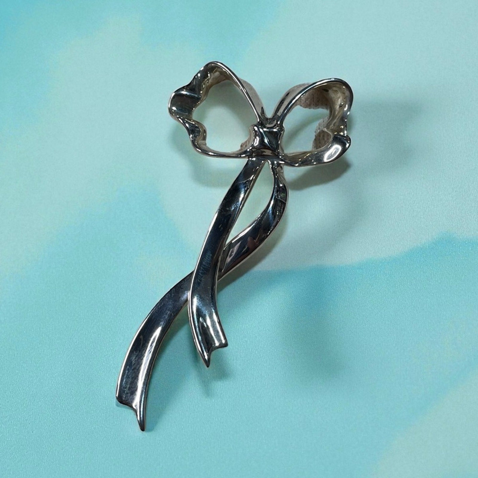 Tiffany and Co. Elegant Silver Bow Brooch 2in x 1 in 925 silver