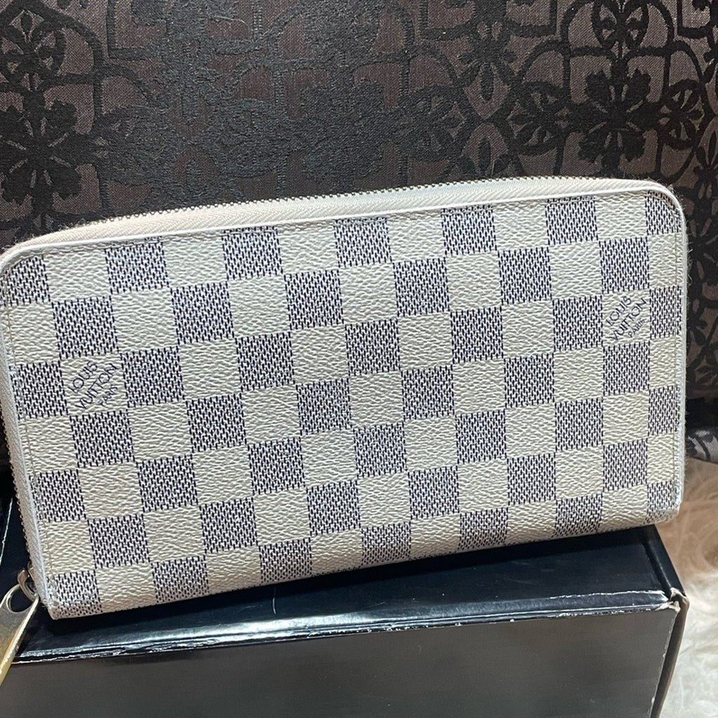 Louis Vuitton Azure large Organizer Wallet Full zip. Comes with a COA