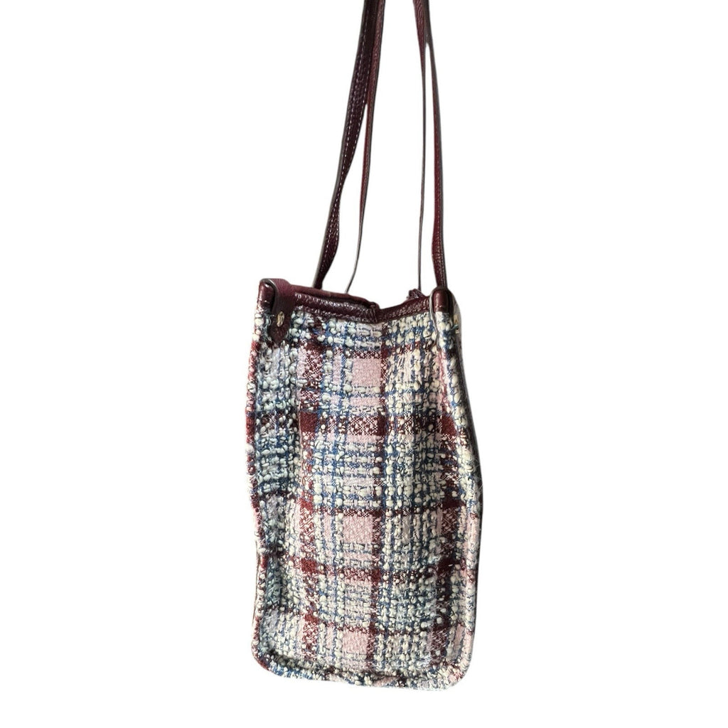 Kate Spade New York Market Medium Tote is crafted from cozy tweed And Leather
