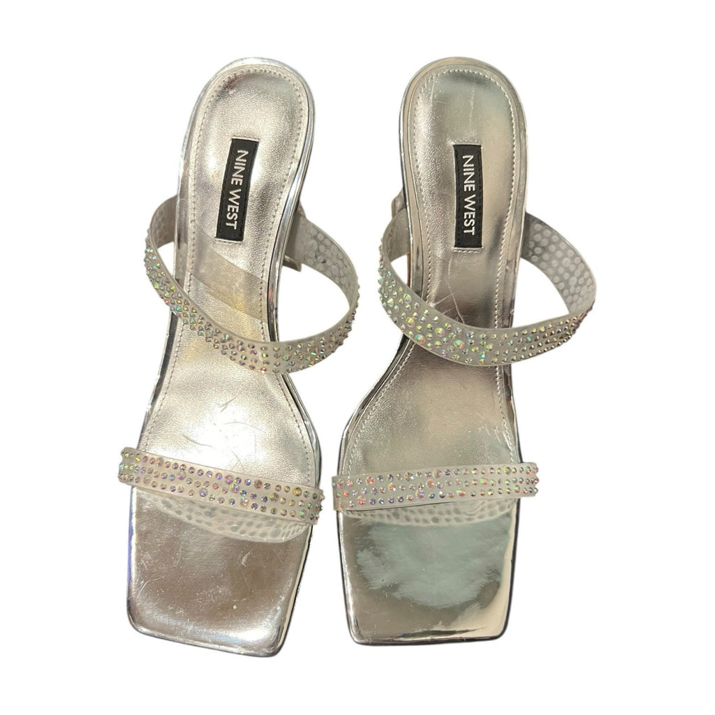 Nine West Yogirl sandals feature a metallic silver shimmer Women’s 8