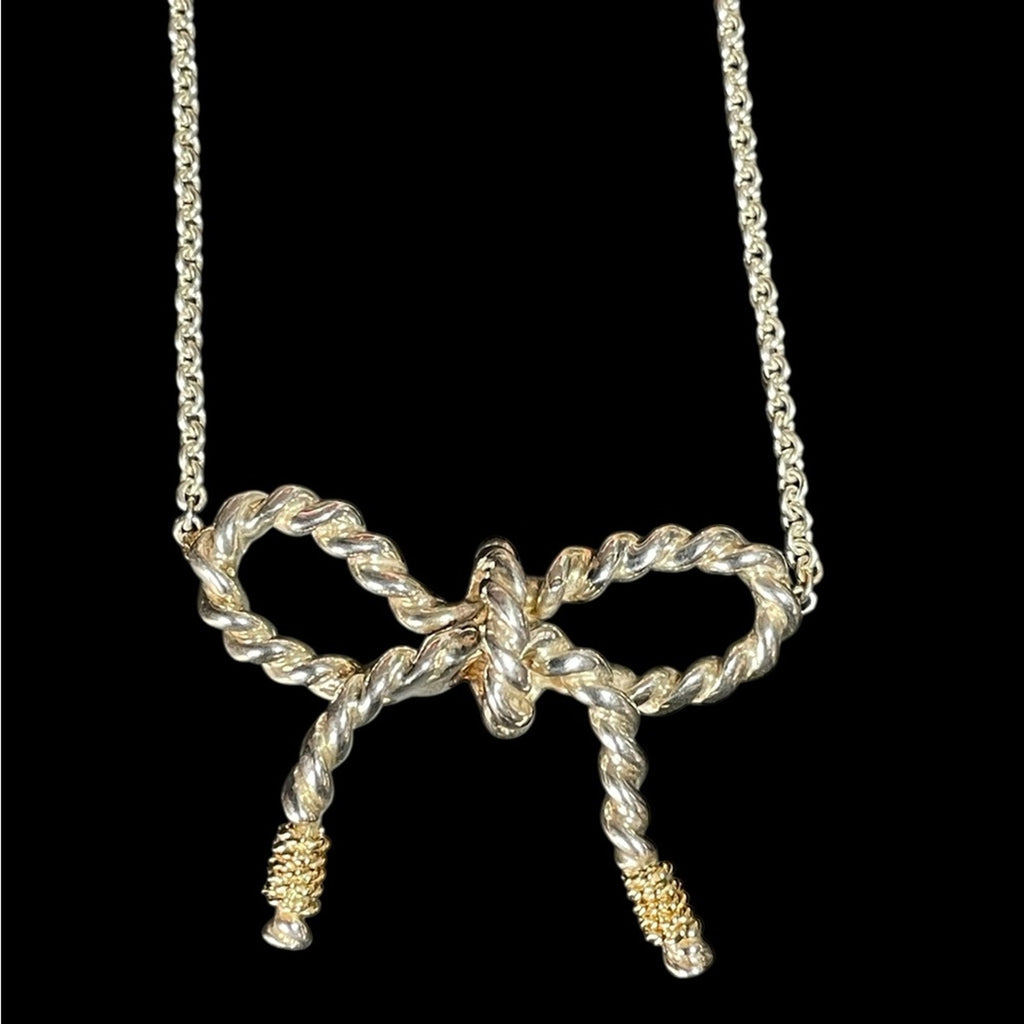 Tiffany & Co. 925 sterling silver and 750 Gold twist bow ribbon necklace.