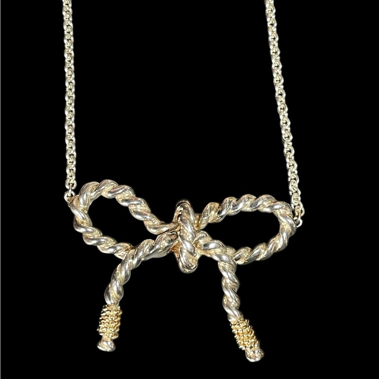 Tiffany & Co. 925 sterling silver and 750 Gold twist bow ribbon necklace.