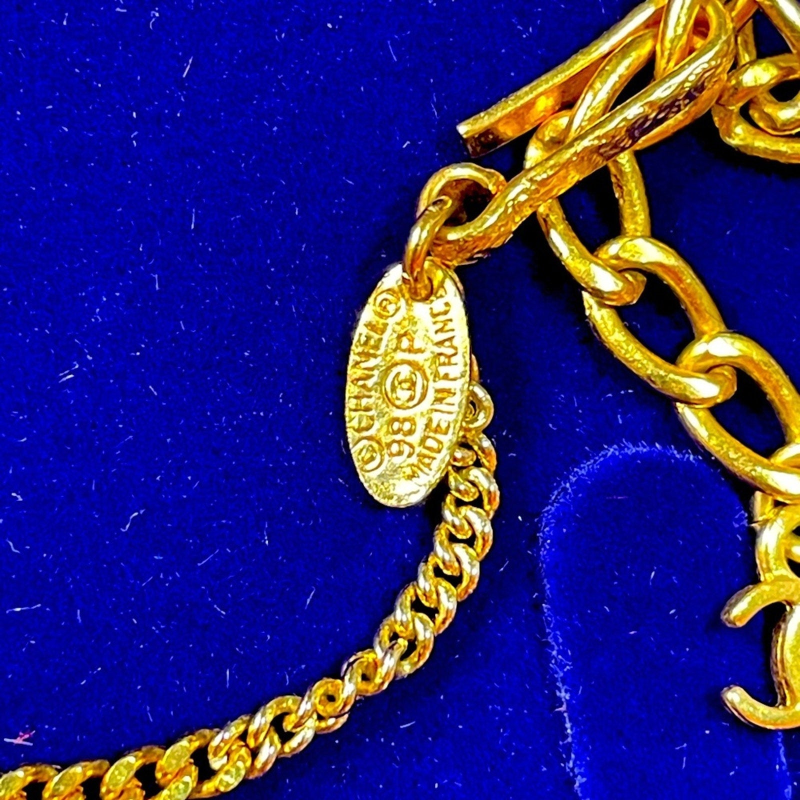 CHANEL Gold and White Necklace with Elegant Design Pre Owned