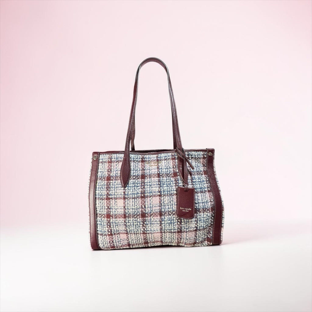 Kate Spade New York Market Medium Tote is crafted from cozy tweed And Leather