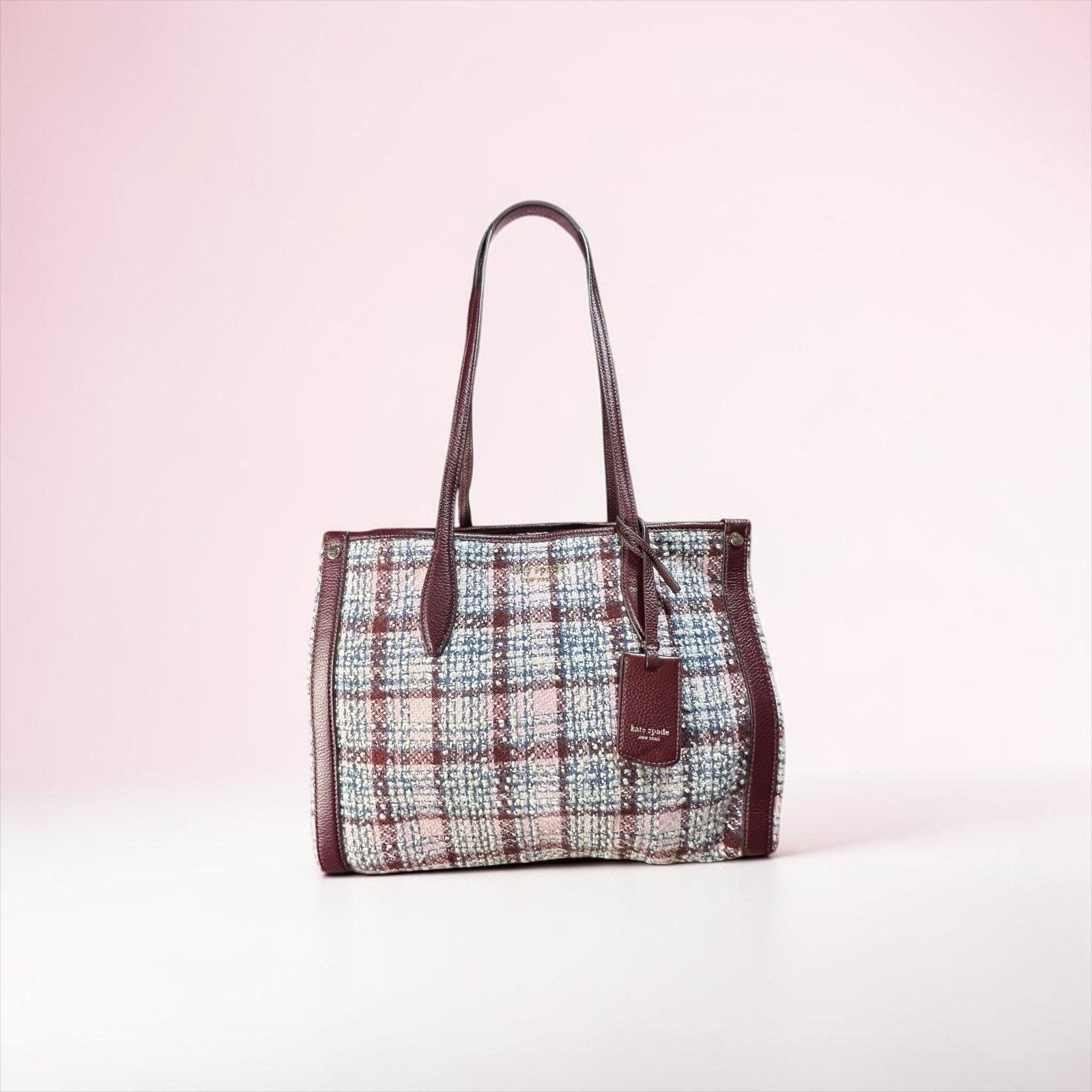 Kate Spade New York Market Medium Tote is crafted from cozy tweed And Leather