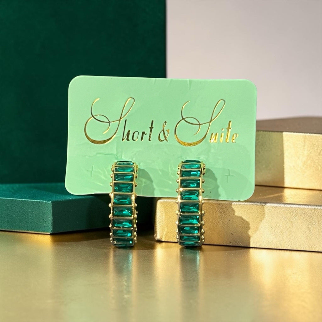 Short & Suite hoops feature emerald green baguette-cut crystals New