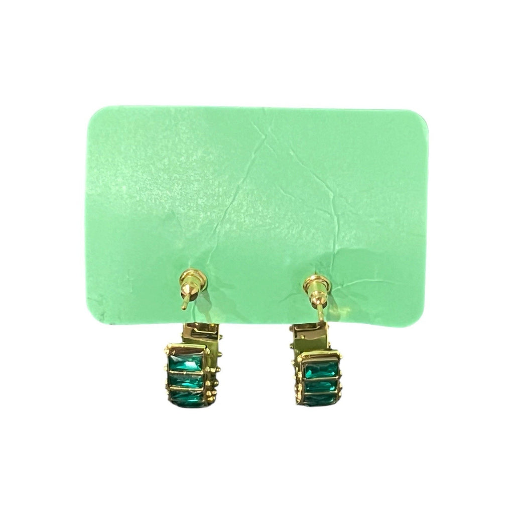Short & Suite hoops feature emerald green baguette-cut crystals New