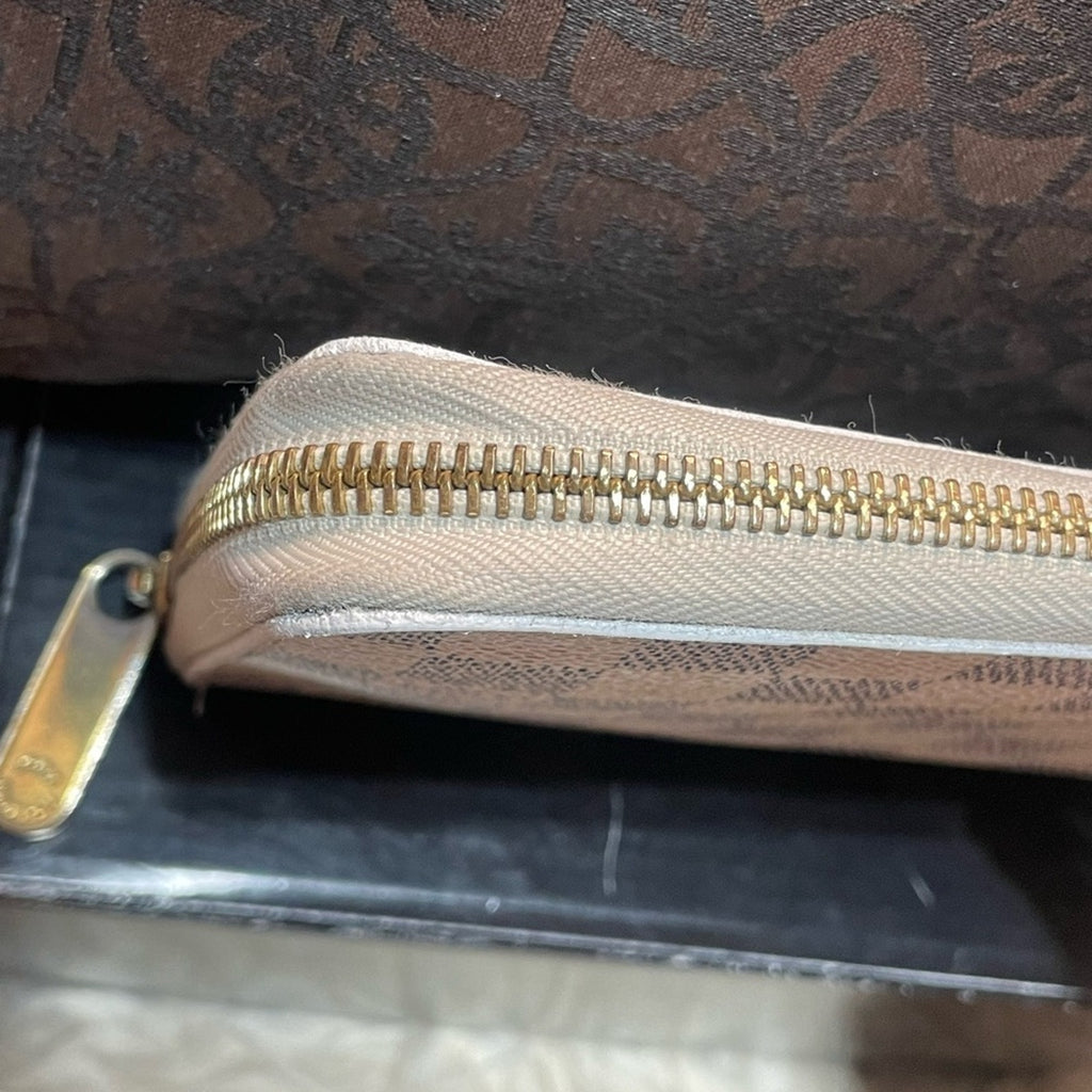 Louis Vuitton Azure large Organizer Wallet Full zip. Comes with a COA