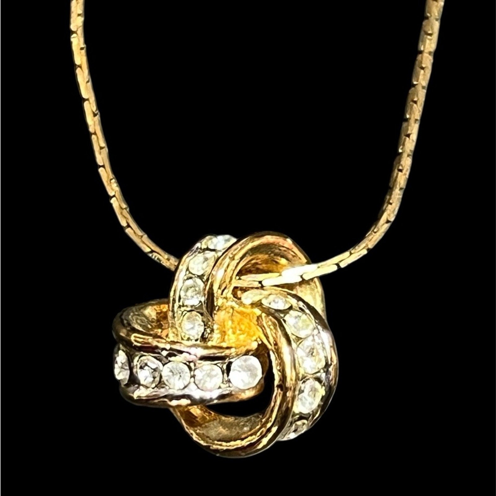 Yves Saint Laurent Gold tone Crystal Knot 18 in Necklace