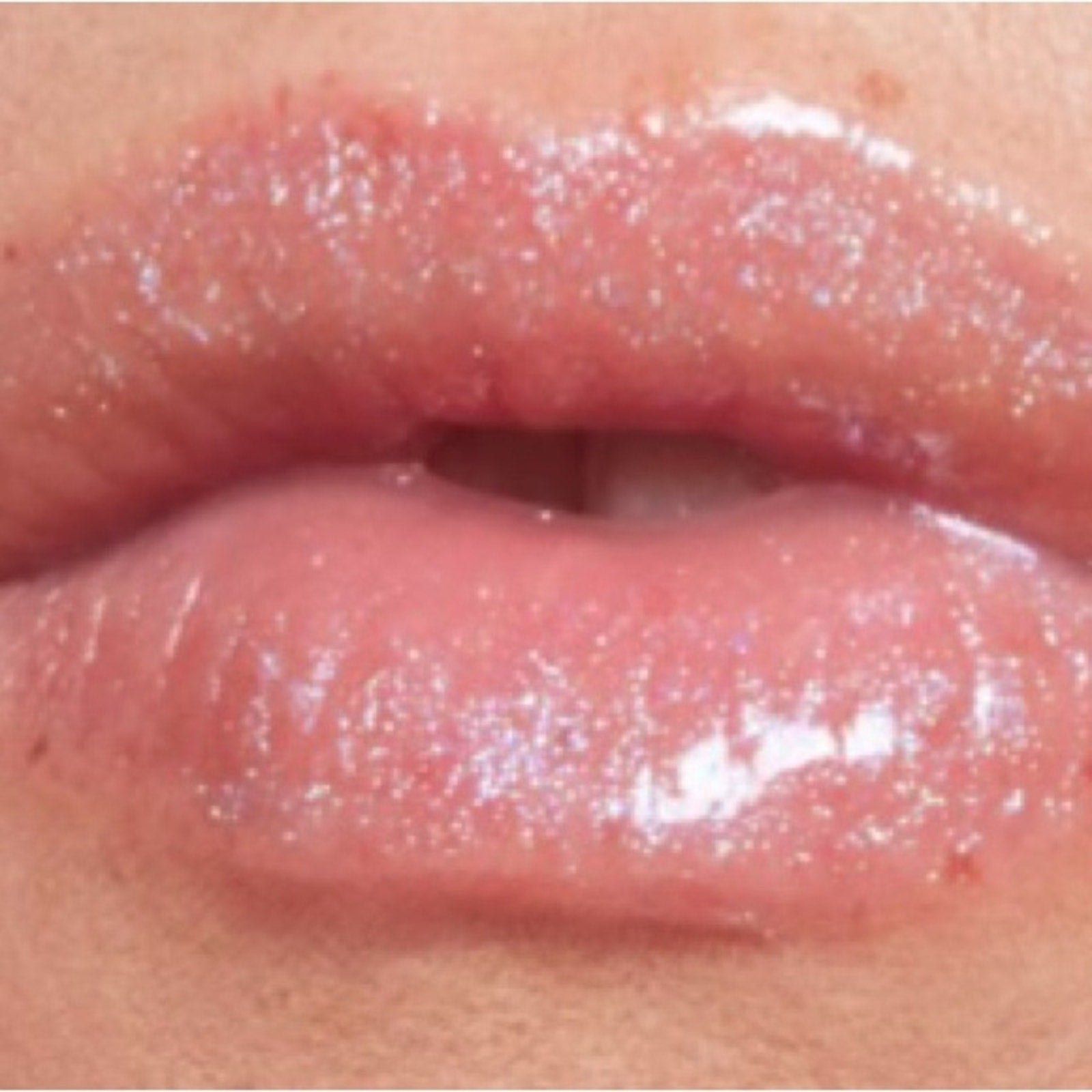 Milk Makeup Holographic Lip Gloss - clear with Blue Shimmer Effect